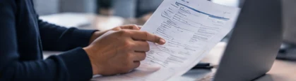 Person checking a freight invoice